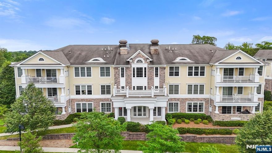 Experience luxury living at the sought-after Four Seasons at Ridgemont, Montvaleâ€™s premier 55+ community. This immaculate 1,957+ SF Marigold model offers 2 bedrooms, 2 full baths, and is ideally located on the top-floor penthouse level with a private corner entry and elevator access. Showcasing beautiful views of the clubhouse and manicured grounds from your private terrace, this premier location is truly unmatched! Enjoy low-maintenance living with two indoor parking spaces and beautifully landscaped grounds. The spacious open floor plan features hardwood floors, designer finishes, and custom moldings throughout. The modern chefâ€™s kitchen boasts wood cabinetry, granite countertops, stainless steel appliances, a pantry, center island, and breakfast areaâ€”leading to your private terrace with stunning pool and sunset views. The formal dining and living rooms provide elegant entertaining space, while the cozy family room features a gas fireplace and large windows. The primary suite includes tray ceilings, two walk-in closets, and a spa-like ensuite bath. A second bright bedroom, full hall bath, and laundry room with sink and cabinetry complete this turn-key home. Enjoy exceptional amenities: outdoor pool and spa, clubhouse with kitchen, bocce court, and putting greenâ€”promoting an active, social lifestyle. Conveniently located near shopping, dining, and NYC transportation. Welcome to the lifestyle you deserve!