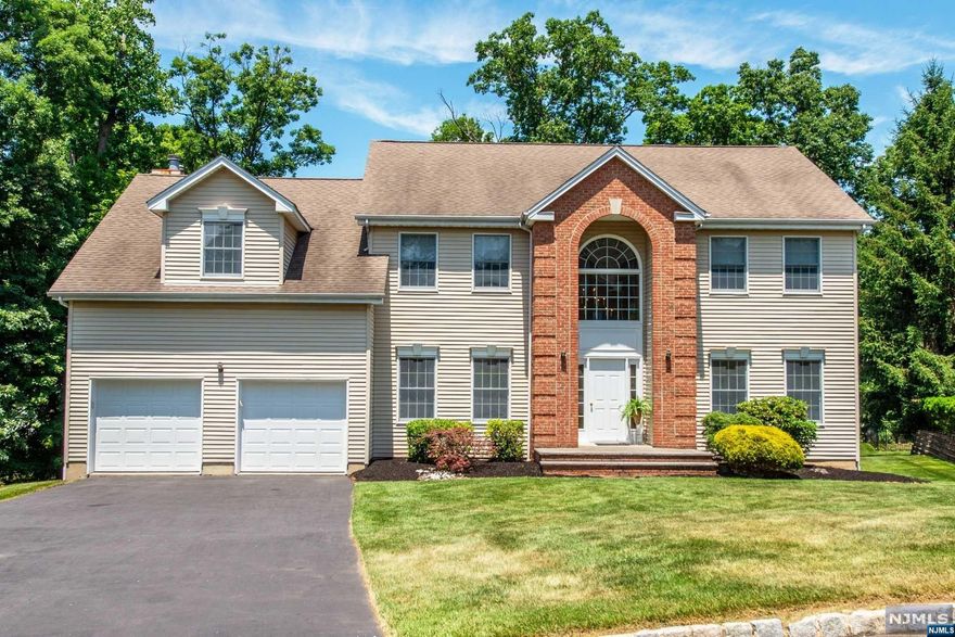 Nestled at the end of a cul-de-sac on one of West Caldwell's most sought after streets sits a stately Colonial with beautifully manicured grounds. True Pride of Ownership resides here in this meticulously maintained Center Hall Colonial! Dramatic 2-Story Entry, Formal LivRm & DinRm, Large Eat-in Kitchen & separate dining area. Eating area opens to a light & bright FamRm w/Gas Fireplace & high ceilings. Powder Rm & Laundry Rm. 1st Floor BedRm which can be used as an Office/Den. 2nd Floor Hosts Gigantic Primary BedRm Suite w/vaulted ceiling, walk-in closet & ample storage, Primary bathroom w/tub, separate shower & skylights along w/3 other Spacious BedRms & a full bath with double vanity. The WALKOUT unfinished BSMNT is a great spot for entertaining & games. Lots of additional storage space! Relax outside on the deck overlooking the spacious & private yard. 2 car garage.