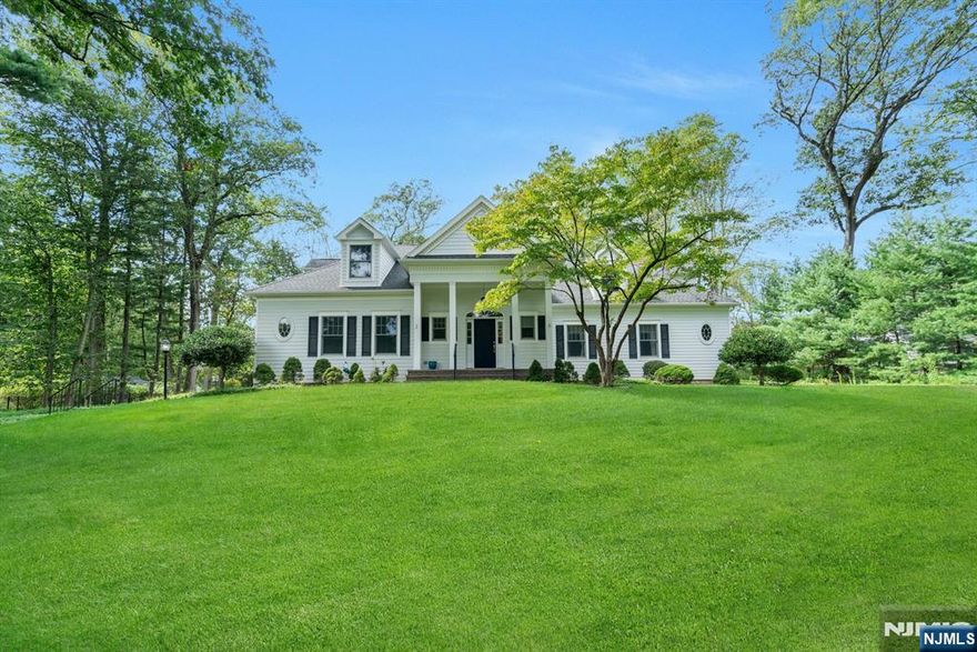 Welcome to this beautifully appointed Saddle River residence, set on a picturesque one acre, tree lined street. This 4 bedroom, 3 full and 2 half bath home blends elegance and comfort with generous living spaces. The first floor boasts 9â€™ ceilings and a formal foyer that opens to a grand dining room, a formal sitting room, and a spacious family room with fireplace, custom built ins, and large windows that flood the space with natural light. A full ensuite bedroom is perfect for guests or one floor living. The expansive eat in kitchen, complete with island and walk in pantry, seamlessly connects to the family and dining room. Two guest baths and direct access to the attached two car garage complete the first evel. Upstairs, youâ€™ll find an additional ensuite bedroom, two well sized bedrooms, and a main bath. The full walkout basement offers endless potential, ready to be finished into the ultimate recreation or entertainment space. Nestled in one of Bergen Countyâ€™s most desirable communities, this property offers the perfect combination of space, functionality, and opportunity to create your dream home.