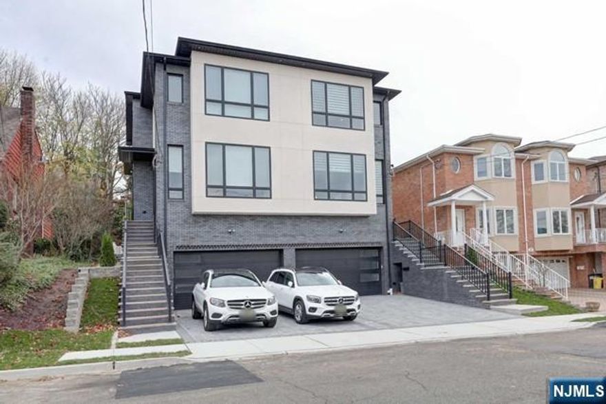 Welcome to 524B Roff Ave,3year old high-end duplexes in Palisades Park. Being situated on a serene dead-end street that is minutes away from NYC transportation, boasting its high ceilings of 10 feet on the main floor along with 11 feet on the second floor, this elegant yet voluminous duplex will never cease to stand out from other regular duplexes. Main floor gloats its brand-new open concept with a creative and innovative modern eat-in-kitchen, 3-zone heating, central A/C, hardwood floors throughout, and custom crown moldings. lots of closet space, ground floor has summer kitchen with. w/d, close to Broad Ave such as shopping, restaurants, access to highways, and access to NYC transportation. CUSTOM WINDOW BLIND STALLED, MUST SEE!