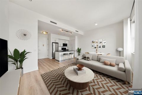 Photo of 4 Beacon Way #1407, Jersey City, NJ 07304 (MLS # 25041411)