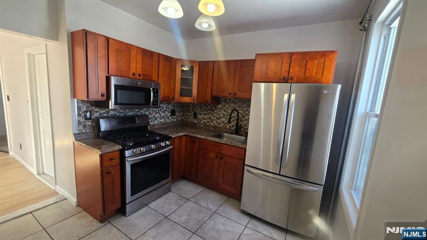 Welcome to this charming 2-bedroom second-floor apartment offering a sun-filled living room and an inviting eat-in kitchen â€” perfect for everyday living. Conveniently located near public transportation for an easy commute.