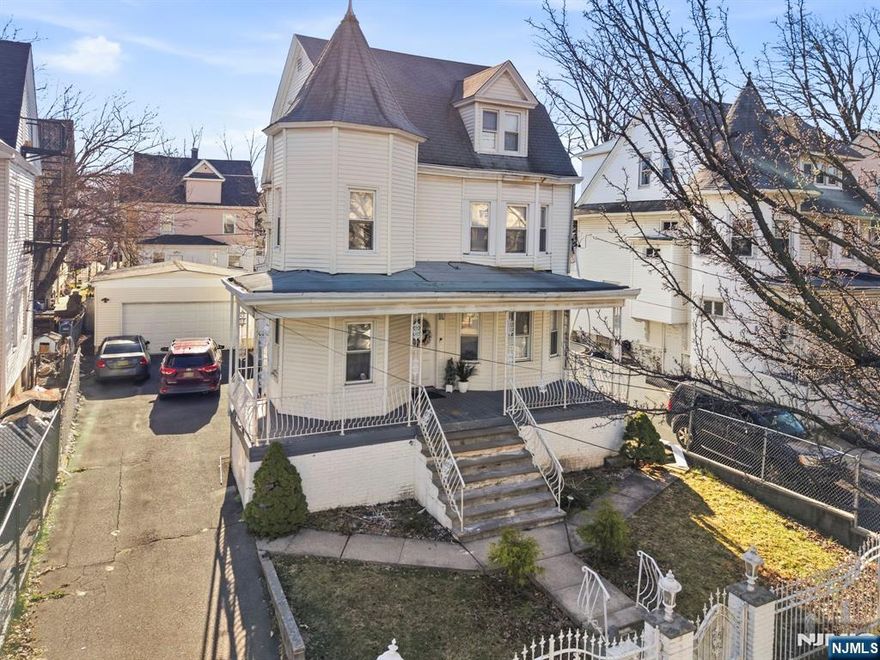 Welcome to this spacious and elegant Victorian-style home located on a quiet residential street in Newark. offering approximately 2,300 square feet of living space, this impressive property features 5 generously sized bedrooms and 3.5 bathrooms, providing ample room for comfortable living.Blending timeless charm with modern updates, the home showcases a beautiful wrap-around porch, high 9-foot ceilings, and hardwood floors throughout the main level, creating a bright and inviting atmosphere. The kitchen features granite countertops and plenty of space for cooking and entertaining.The layout, multiple levels, and existing separate entrances make this property ideal for a multi-family conversion or income-producing setup. The full finished basement adds valuable flexible space, perfect for extended living, recreation, or additional unit potential.Additional highlights include a newer roof and water heater for added peace of mind.Situated on a sizable lot, the property also includes a private driveway and a detached 2-car garage, offering ample off-street parking.A rare opportunity to own a large, character-filled home with versatility and strong income potential ideal for homeOwners, investors, or multi-generational living.