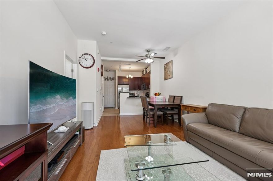 Welcome home to this Beautifully maintained 1 bedroom & 1.5 bath residence at the M in Englewood Condominium. This home offers a well-designed layout with spacious living spaces, ample natural light, hardwood floors and modern finishes throughout. One indoor garage parking space is included, along with ample outdoor guest parking. Conveniently located near major highways, shopping, dining and transportation, making it ideal for comfortable and convenient living. A great opportunity to enjoy both privacy and accessibility in a desirable community.