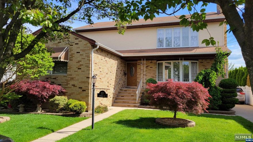 Here is a large two-family on a nice residential street. It is located close to schools, parks, and NYC Bus. The First-floor apartment features a living room with a burning fireplace, a dining room, an eat-in kitchen with an entrance onto the deck and backyard, and a master bedroom with a master bathroom, two additional bedrooms, and a full bathroom. The basement is full and finished with multiple rooms and a full bathroom. There is a two-car detached garage and a cement driveway with ample parking. There are separate utilities and central AC on all floors. This house has too many features to list, so could you come and see it for yourself?