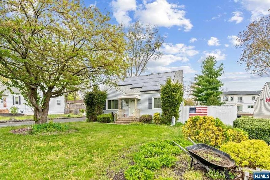 Welcome to this beautifully situated cape cod on a quiet street in one of the most sought after towns in Bergen County! Conveniently located near public transportation, parks, schools, shopping, restaurants & worship! First floor features living, dining, kitchen, two bedrooms with main bath. Second floor includes two bedrooms & additional full bathroom. Basement is full, partially finished with separate recreational space, laundry/ utility room, loads of storage with exterior access to your backyard. Over 11,000 exterior sq ft this home also features a 2 car garage & an additional structure with electric! The opportunities are endless here! This home is surrounded by new construction properties with high value! You can build your own dream home or renovate to your liking! Property sold in as is condition.