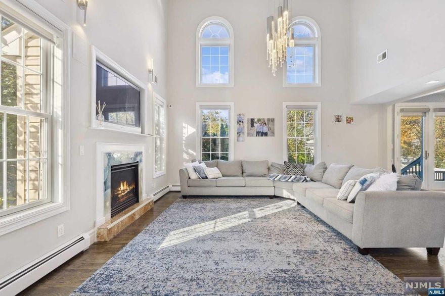 Welcome to this beautiful center hall colonial (built in 2007 and updated about 5 years ago) located on a large property on one of the most desirable blocks in New Milford. It features a beautiful 2-story entranceway, banquet-sized dining room, 2-story family room, first-floor bedroom with ensuite full bath, a custom-designed kitchen with 2 sinks, 2 dishwashers, full-sized refrigerator/freezer, and gourmet island. The second floor features a large primary suite with a full bath, 3 additional bedrooms, and a hall bath. The fully finished basement has a large rec room, bedroom, full bathroom, office, and garage. This house is a must-see!!