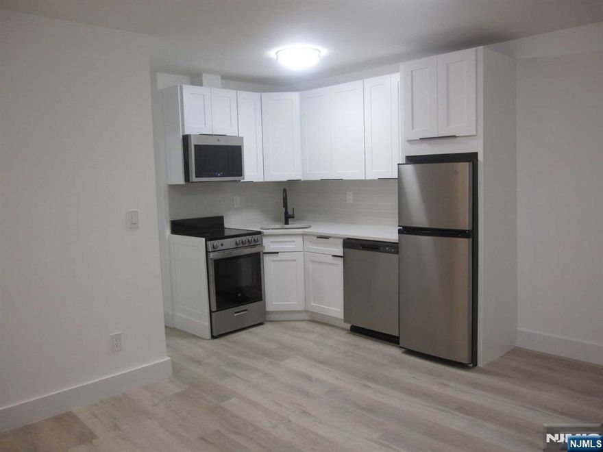 NEW, TOTALLY RENOVATED 1 BEDROOM APARTMENT, NEW KITCHEN WITH STAINLESS STEEL APPLIANCES, NEW WINDOWS, NEW FLOORS, NEW BATHROOM, AC. READY TO MOVE IN. NEAR TRANSPORTATION, SCHOOL, HOSPITAL, PARKING AVAILABLE. LAUNDTY ROOM ON LOWER LEVEL.