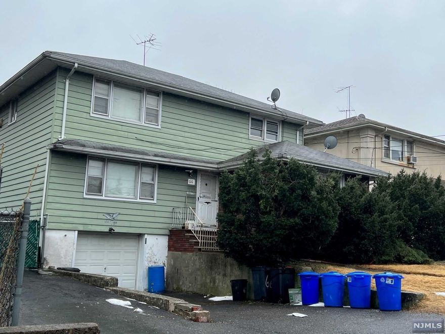 CONVENIENTLY LOCATED 10 ROOM 2 FAMILY HOME ON 50 X 100 FENCED IN PROPERTY WITH MANY PARKING SPACES AND OVERSIZED 1 CAR ATTACHED GARAGE WITH ENTRANCE TO BASEMENT. THE 1ST FLOOR FEATURES 3 LARGE BEDROOMS, LOTS OF CLOSET SPACE, FULL BATH, SPACIOUS LIVING ROOM, LARGE KITCHEN AND DINING AREA, OPEN ENTRANCE TO YARD. THE 2ND FLOOR FEATURES LARGE LIVING ROOM, KITCHEN AND DINING AREA, 2 GENEROUS SIZED BEDROOMS, FULL BATH. SEPARATE UTILITES, HOT WATER GAS BASEBOARD HEAT, HARDWOOD FLOORS THROUGHOUT HOME NEEDS UPDATING, HOUSE SOLD IN AS IS CONDITION.