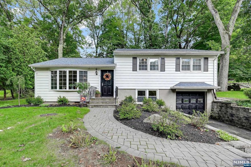 Tucked away in the Dogwood section of town, this 3BR/2FBA split level is a sweet place to call home! Open first floor layout with hardwoods in liv rm and din area, kit w/granite island and counters, maple cabinetry, ss appliances! Quaint 3 season room off the din rm/kit which leads to the rear yard! 2nd Floor has hardwoods in the bedrooms. Primary suite w/primary bath (shower stall) and two closets! Two additl. BRs and a full ba complete the 2nd level. Ground Floor has entr to 1 car att garage, tiled fam rm/office, laundry and extra large utility room/storage space! Attic storage as well as additional crawl space storage on 2nd floor. Central Air! Roof 2020. Rear yard is a private and tranquil oasis. Close to Oakland's excellent schools, parks/rec field and downtown shopping! Easy commuting with bus lines and Rt. 287 close by! You won't want to miss this one!