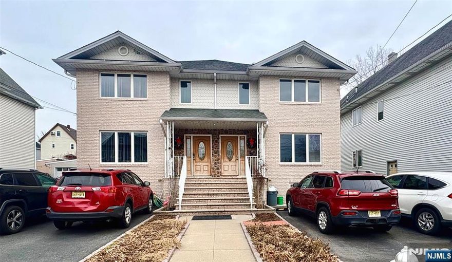 Beautifully maintained duplex located on a charming street in Garfield. The first floor offers a spacious and cozy layout featuring a large living and dining area, a sun-filled kitchen, and a full bathroom. The second level includes a Master bedroom with a full en-suite bathroom, two additional generously sized bedrooms with ample closet space, and another full bathroom. The basement provides washer and dryer hookups along with a family room. Additional highlights include hardwood floors throughout, access to a deck and side yard, and attic access. This is a must-see opportunity that wonâ€™t last long!