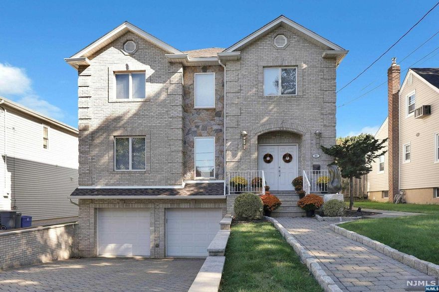 Great 9 room, 5 bedroom, 3.5 bathroom ,center hall colonial home! Builder's home, built 19 years ago. The house is 35x52 feet, almost 3700 sq ft of living space not including the garage or basement! The first floor features a living room, formal dining room with granite flooring, a brand new kitchen with granite countertops and stainless steel appliances, glass sliding doors that lead to a paved patio. A guest bedroom, half bath and a family room with 10 foot ceilings and wood burning fireplace with high end Eiklor gas logs. The second floor features 4 large bedrooms, a full bath, with a large primary bedroom with tray ceiling and primary bathroom. There are 2 large walk-in closets and a sitting area. The finished basement has 9 foot ceilings with a walkout entrance in the rear, and a large den with full bath. 2 car garage, baseboard gas heating, 75 gallon hot water heater, central vacuum, paver driveway in the front, and walkway towards the rear of the house! Great location!