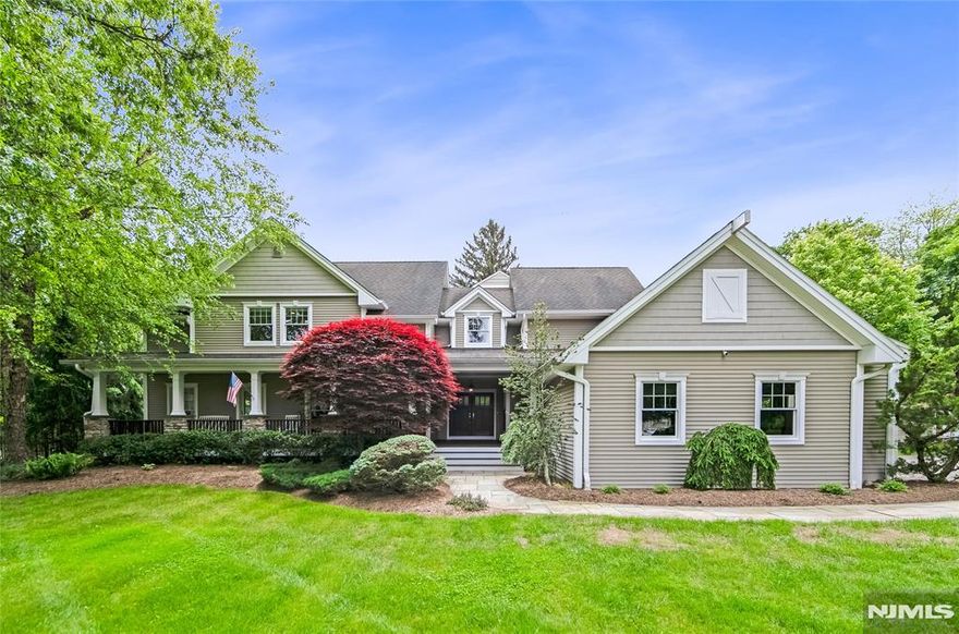 This beautiful Farmhouse Colonial on approximately 1.20 acres exudes warmth amidst its luxury in the Sicomac section of Wyckoff! Privately nestled in mature plantings, this 5 Bedroom/3 Full Bath home welcomes visitors onto its Ipe Wood, lemonade porch, leading to a double door entry. The foyer reveals an open and airy floor plan. Lounge in the living room in front of the wood burning fireplace or gather around the island in the modern eat in kitchen. A charming screened in porch is the perfect spot to sip a steaming cup of morning coffee while enjoying the view of the fenced-in, manicured property. Or venture through the sliding glass doors to enjoy an evening beverage under the pergola next to the crackling fire pit. A heated, Gunite, salt-water pool awaits, flanked by a pool house with changing room, bar, refrigerator, and television. Upstairs is the primary bedroom with a tumbled marble ensuite, 2 walk-in closets, a steam shower, and a balcony overlooking the expansive back yard. Other features include a two-car attached garage and a two-car detached garage. There is a large shed for storing outdoor furniture or sporting equipment. Original to the property is an ultra-charming structure that was once an out-house! Looking for efficiency? This home has multiple zones for heating, including radiant, and central a/c. New in 2024/25 are the boiler, an AC unit, and pool heater.