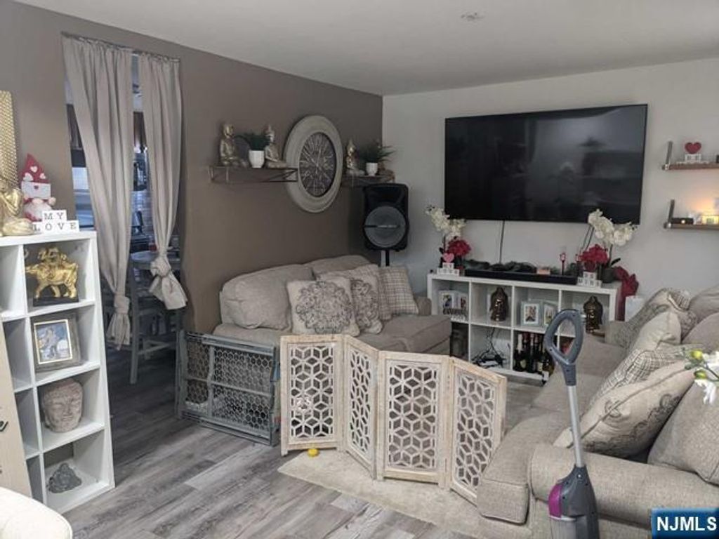 Photo of 401 River Drive, Garfield, NJ 07026 (MLS # 26008230)