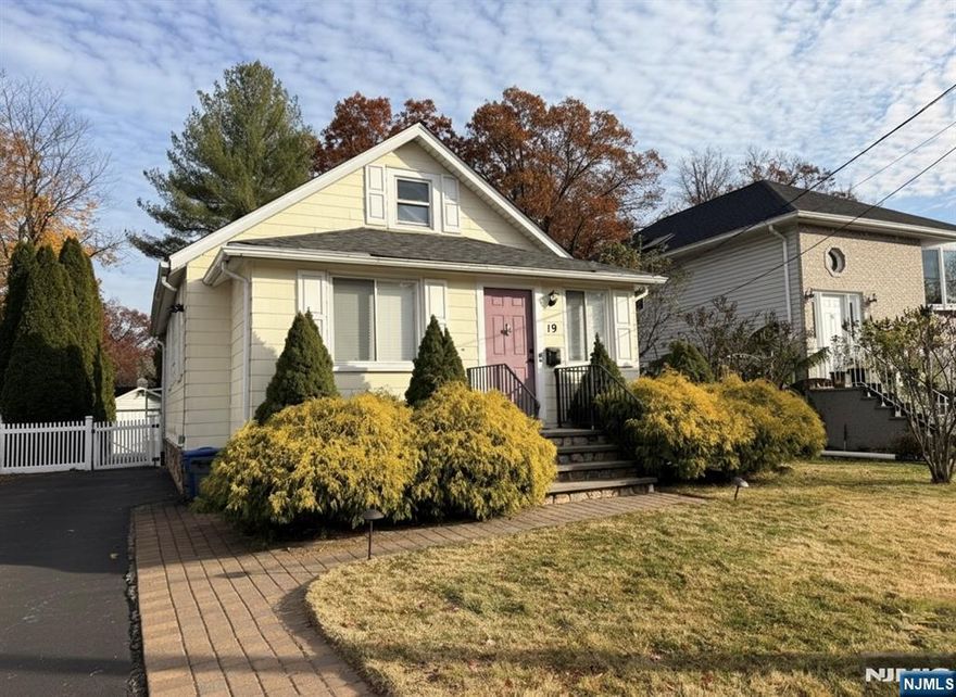 Charming 2BR/2BA ranch on a quiet Dumont street featuring a modern eat-in kitchen, den, living room, enclosed sunroom, and hardwood floors. Finished basement includes a rec room, full bath, and laundry. Private yard with detached garage. A well-kept home with great appeal.