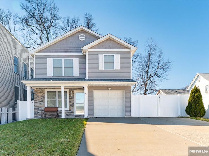 Welcome to this spacious and well-maintained 3-bedroom single-family home located in Roselle, offering a bright open layout and modern updates throughout. The main living area features beautiful hardwood floors, recessed lighting, and an abundance of natural light, creating a warm and inviting space perfect for everyday living and entertaining.The home includes a modern kitchen with granite countertops, stainless steel appliances, custom cabinetry, and a breakfast bar, flowing seamlessly into the dining area with sliding glass doors leading to the backyard, ideal for indoor-outdoor living.Upstairs you'll find three generously sized bedrooms, including a large primary suite with a walk-in closet and en-suite bathroom featuring a glass-enclosed shower. Additional bedrooms offer comfortable space and great natural light.Additional highlights include multiple bathrooms with updated finishes, a dedicated laundry area, ample storage space, and an attached garage.The property also features a mechanical security gate providing controlled access to the driveway and additional privacy, adding an extra level of security and convenience.Located in Roselle, Union County, residents enjoy convenient access to parks, schools, shopping, restaurants, and NJ Transit train and bus service, making commuting to Newark, Elizabeth, and New York City easy. This home offers the perfect combination of space, comfort, and commuter convenience. Highest and Best due Wednesday, March 18th at 6:00 PM.