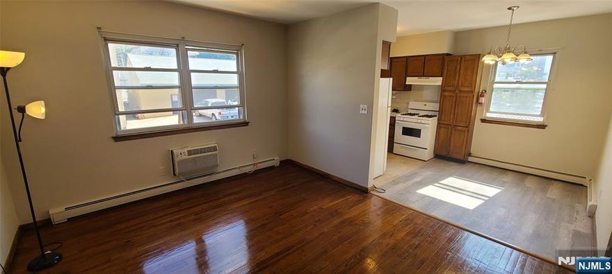 Large 1 bedroom with a bonus den/office space and 1 bath in heart of Garfield. First floor unit! Laundry on premises. Heat and hot water included. Tenant only pays electric. Available for immediate move in. Off street parking in private parking lot. No pets. Please see Virtual Tour.
