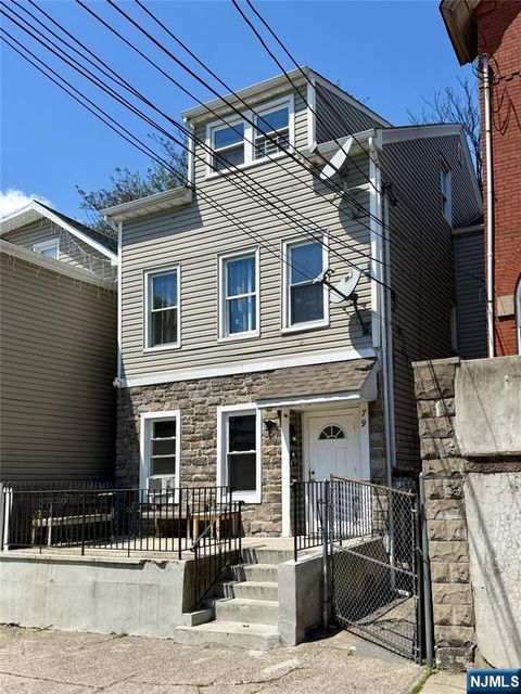 Photo of 79 Godwin Avenue, Paterson, NJ 07501 (MLS # 26015646)