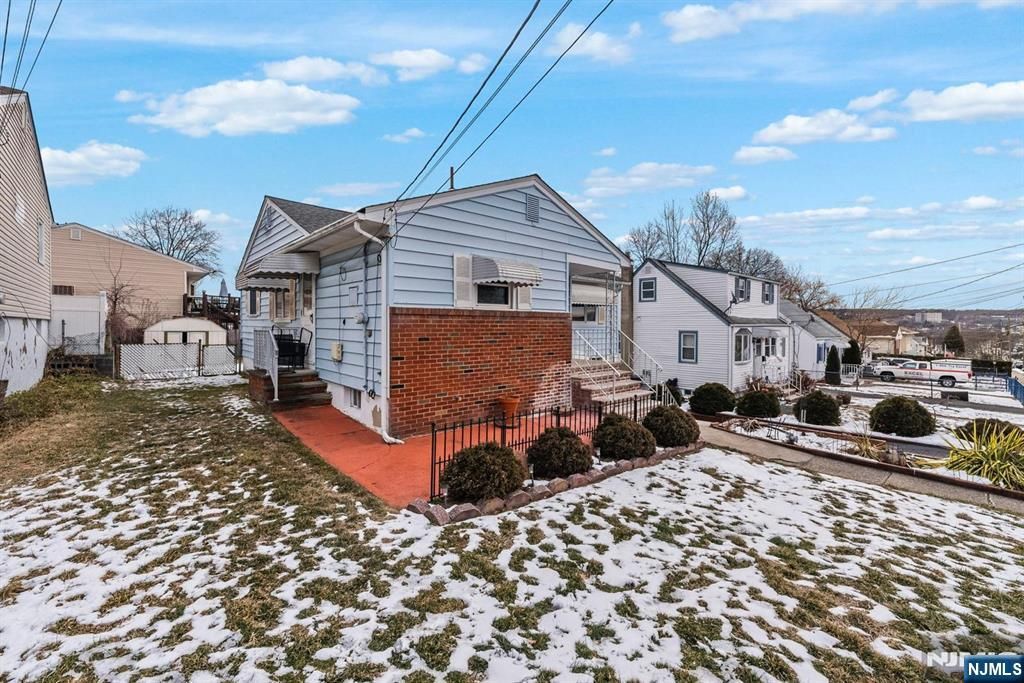 Photo of 316318 Maitland Avenue, Paterson, NJ 07502 (MLS # 26003450)