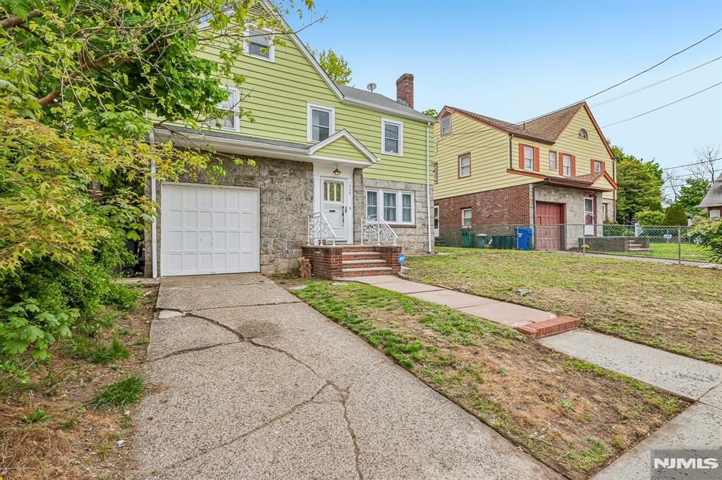 Photo of 335 19th Avenue, Paterson, NJ 07504 (MLS # 26015910)