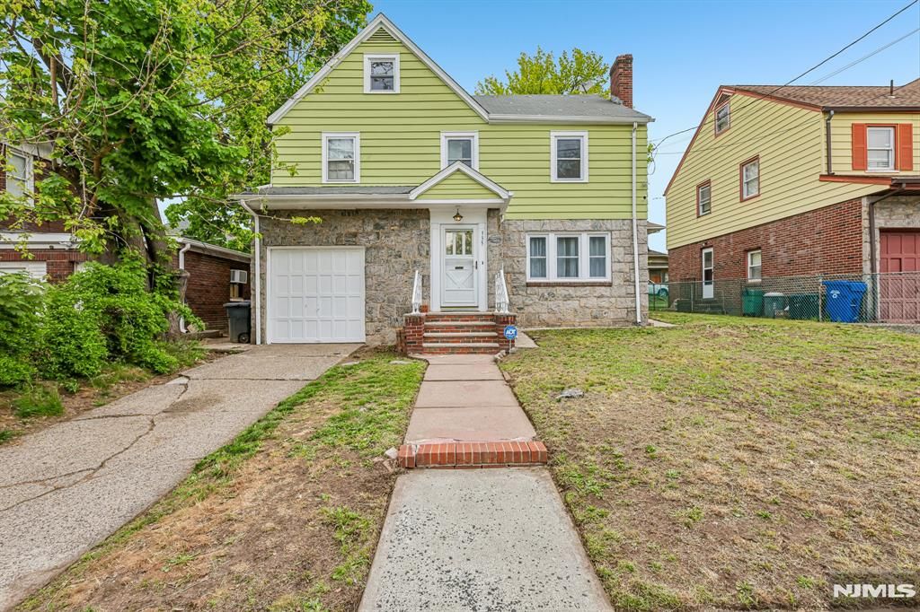 Photo of 335 19th Avenue, Paterson, NJ 07504 (MLS # 26015910)