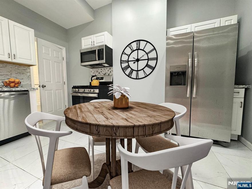 All Newly Remodeled Single Family Home  features a total of 4 bedrooms and 3 Full Bathrooms. The first floor comprise a large bedroom on the main Floor,  Full bathroom, Kitchen and Living Room areas. The second floor has 3 bedrooms. The Main Bedroom offers a oversized closet  and Full Bath En Suite. This property boast all-new updated kitchens complete with shaker cabinets, granite countertops, and stainless steel appliances, including  stove, dishwasher/microwave, and side-by-side refrigerator with ice-maker.  The entire home features ceramic tile and luxury vinyl flooring. Spacious and Fully Finished Basement with recessed lighting, flooring and Full bath, Laundry Area and separate area for Utilities.  Great Space for Family Room, Office , Workshop or a space to entertain family guests. Benefit from low taxes and the convenience of close proximity to schools and transportation. Just minutes away from Downtown Newark Penn Station, (GSP), and I78, Great for commuters. awesome opportunity for a large family looking for a move-in ready