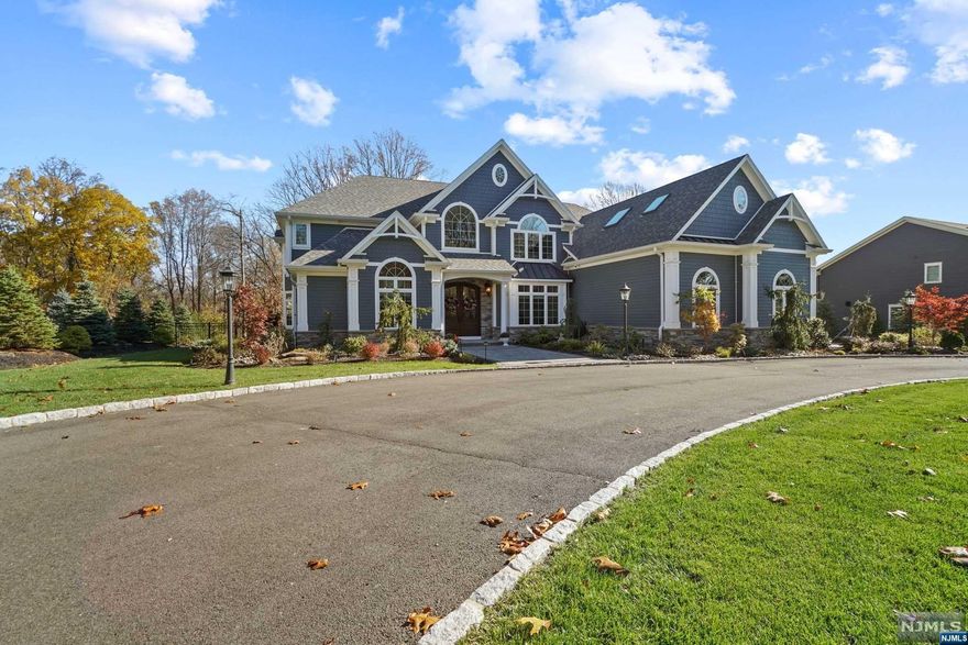 Builder's home- custom dream home nestled on over 3 sprawling acres. This 6-bedroom, 4.5-bath colonial center hall offers an unparalleled level of luxury and sophistication. High ceilings and 2-story entry foyer, adorned with a grand winding staircase that exudes timeless elegance. The open family room boasts a striking stone fireplace and shiplap accent wall, creating a warm and inviting atmosphere for gatherings. A large guest suite and laundry room complete the first level. The gourmet kitchen features exquisite finishes and top-of-the-line Wolf appliances. On the second level, the primary bedroom boasts dual walk-in closets & a luxurious marble bath. Step outside to Trex deck and a paved patio with tranquil waterfall and fire-pit, creating an serene outdoor oasis overlooking untouched natural wooded property. Additional features include a built-in sound system, circular driveway, 3-car attached garage, and Energy Star Rated Home. Blue Ribbon Schools.