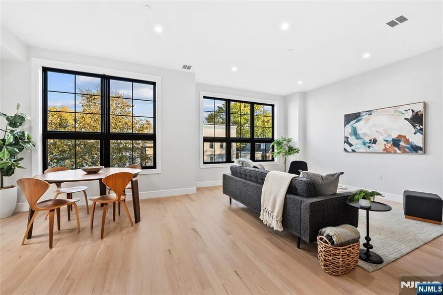 Last Unit Available! Stunning New Construction 2BR/2BA with Private Rooftop & Parking. Welcome to 163 Delaware, a boutique 3-unit building offering high-end finishes and quality construction. This 1,400 sq. ft. 2-bedroom, 2-bath home features an open layout with Samsung appliances, quartz countertops, oak hardwood floors, smart entry, and floor-to-ceiling tile bathrooms. Enjoy your own private 865 sq. ft. rooftop deck, accessed via a custom staircase, plus one tandem garage parking space.Located near Lincoln Park, PATH and bus service to NYC, and Citi Bike stations. 10-year builderâ€™s warranty included.