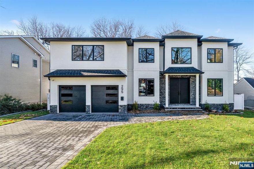 Spectacular brand new construction masterpiece on the ultra-desirable East-Side of Paramus built by an extremely reputable local builder. This stunning 6 bedroom 6.5 bathroom home will offer 6,200+ sq ft on all levels. Dramatic 2 story entrance foyer. Classic center-hall layout with LR / DR to the L & R of the foyer. Butler's pantry plus a fabulous chef's kitchen with designer cabinetry, SubZero, Wolf, XO appliances, huge center island, quartz countertops & stunning wood fluted details that carry over to the open-concept Great Room with FP. Primary Oasis upstairs with spa-like en-suite bathroom with soaking tub, double vanities, and huge shower. Each bedroom offers private en-suite bathrooms and WICs. Extremely comfortable 1st floor guest suite with large closet & full bath w. shower. Amenity-Packed basement with home gym, movie theater, bedroom, and full bathroom. 2 car garage & so much more. Estimated completion End of September 2024.