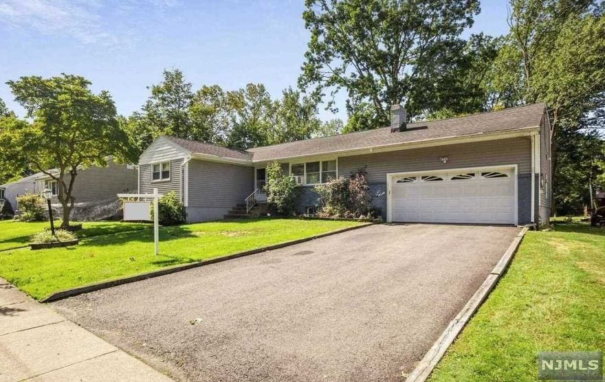 WELCOME to this very well crafted Mid Century home that feels tucked away and truly is! Open Concept floor plan at 1804 SF. Living room has a true fireplace, plus plenty of room for furniture and play. The Master Suite with it's own staircase offers some private escape. Enjoy a cozy breakfast overlooking a tranquil backyard. Skylights above bring nature just a little bit closer. Tons of storage built into some hidden pockets, plus a 2 Car garage and a vast partially finished basement. SUPER CLOSE to 80,17,GSP, Paramus shopping and Bergen County Park. This home has a newer roof, brand name mechanicals, UG lawn sprinklers. Not a tract house, Custom Built with much attention to detail. There's just no place like HOME.