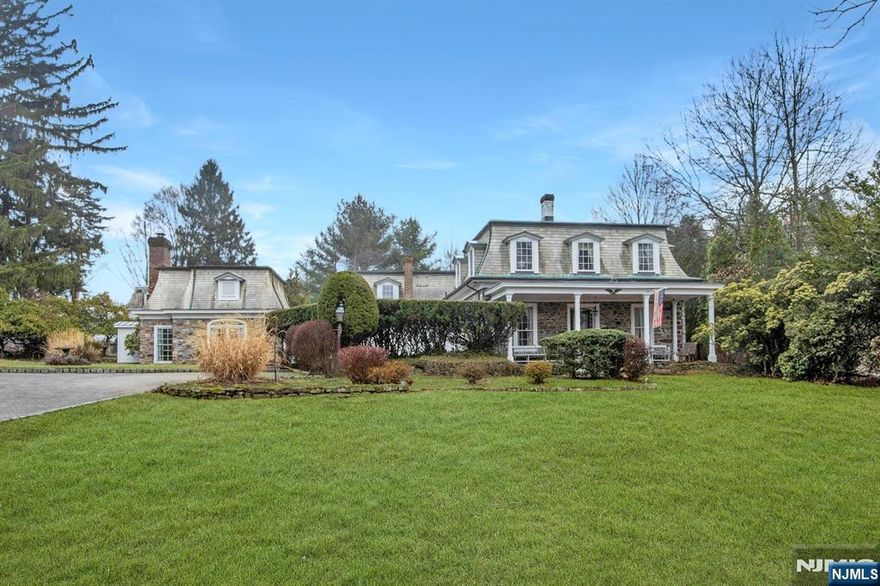 Nestled in the heart of Saddle River, this charming Dutch Colonial home invites you to step back in time while enjoying the comforts of modern living. Set on 1.27 acres of beautifully landscaped property, this antique loverâ€™s dream exudes character and history, from the hand-hewn wide plank flooring to the authentic cedar shake roof. With 3 bedrooms, 3 full baths, and 2 half baths, the home effortlessly blends old-world craftsmanship with contemporary amenities, making it a perfect sanctuary for those who appreciate timeless elegance. Whether you're drawn to its antique allure or the serene surroundings, this Currier and Ives style mini-estate offers a rare opportunity to own a piece of history.