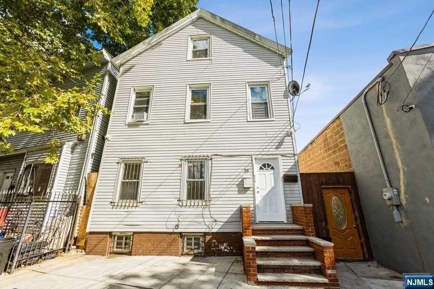 A great 2 family property in Newark's highly sought after North Ward (ZIP 07104).-; Unit 1 has 3 bedrooms and 2 baths.-; Unit 2 has 1 bedroom plus there is a separate "bonus" space on the 3rd floor.-; The 3 bedroom unit and the bonus unit will be delivered VACANT at closing.-; The 2nd floor unit is occupied by a month-to-month tenant.-; This property is just 3 blocks from Branch Brook Park.-; A 15 minute walk to NJ Transit's Broad Street Station (with direct service to New York Penn Station).-; A 15 minute bus ride to downtown Newark.-; LOW PROPERTY TAXES.