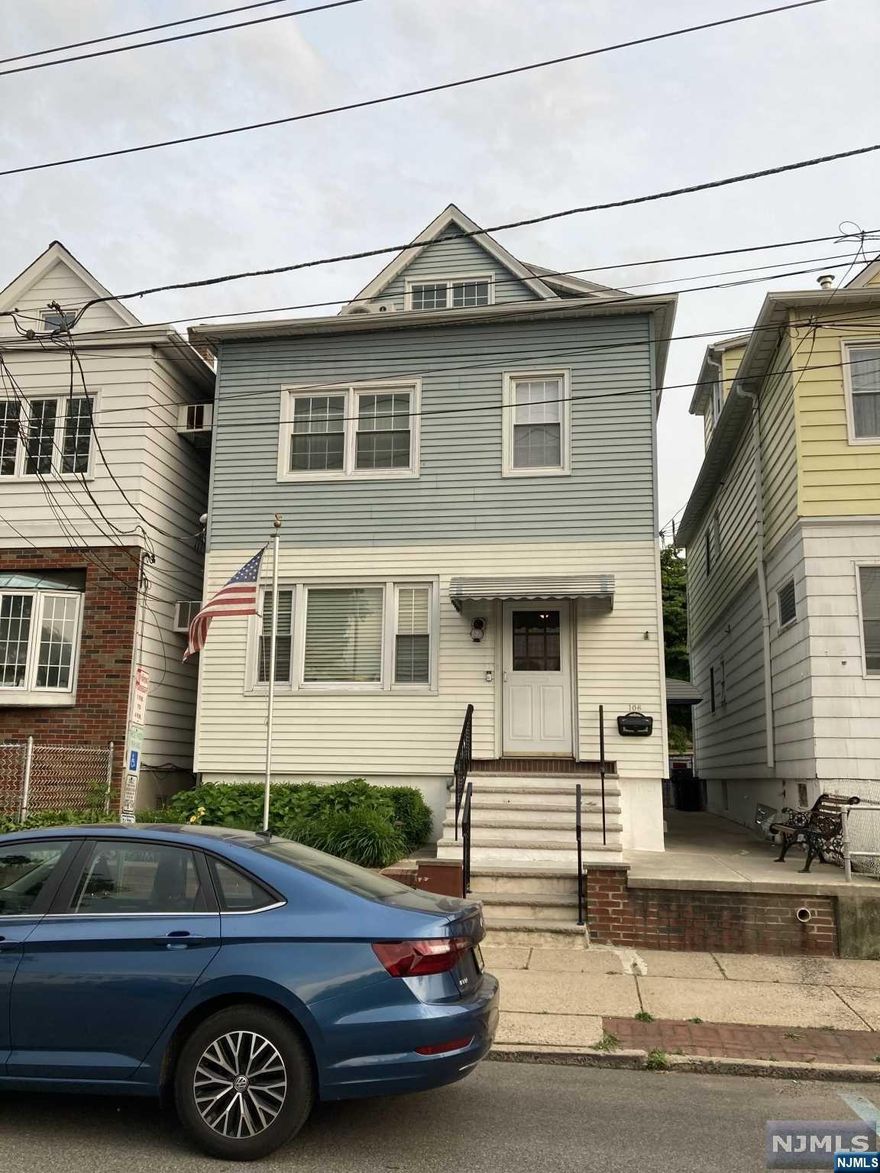 Two family home featuring two units with full finished attic with possible use as family room/office as well as storage and walk in closet. A full basement with bilco doors for access to the fully fenced yard. The yard includes a storage shed and small patio. Separate utilities and two gas heating units. Two hook ups for washer and dryer in basement--2 washers and 2 dryers included as well as stove and refrigerator in basement. Appliances in "as is" condition