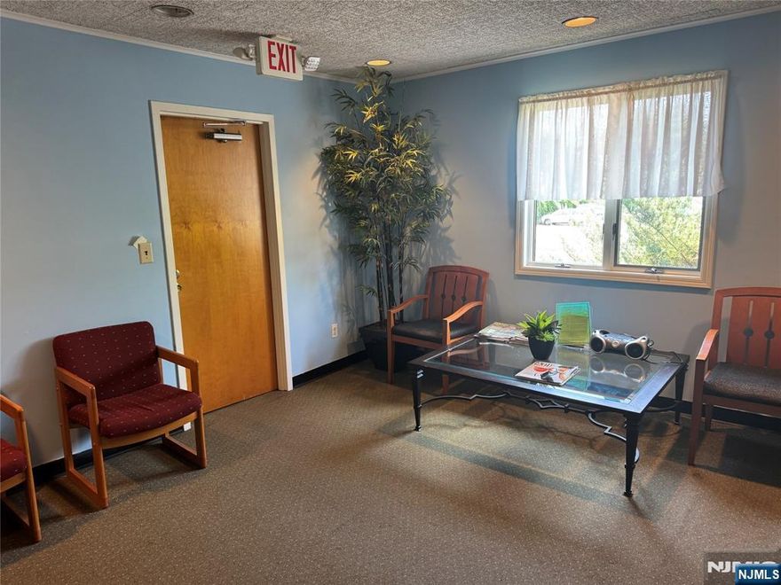 Light and bright corner office in professional building on second floor. New paint/new flooring. Sink and cabinet storage. Includes use of shared waiting room and hall lavatory. Office is 12x9 exclusive of sink area. Tenant pays 20% of utility bill and cleaning bill (approx. $70/mo.) Landlord is responsible for exterior maintenance/snow removal. Landlord is responsible for exterior maintenance/snow removal. Listing agent to accompany all showings. Call/text Donna Allen 973-703-1877.