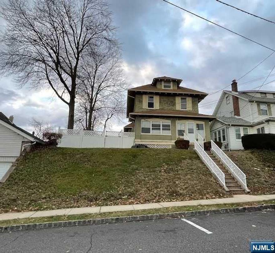 One Family Colonial Centrally Located. 1st floor features a Living room, Dining Room, Kitchen, and half bath. 2nd floor offers three bedrooms and a full bath. Finished walk-up attic. Finished basement has rec room and a half bath, Lots of space. Hardwood floors throughout. Nice size back yard etc., Steps away from schools and public transportation. Close distance to shopping and major highways.