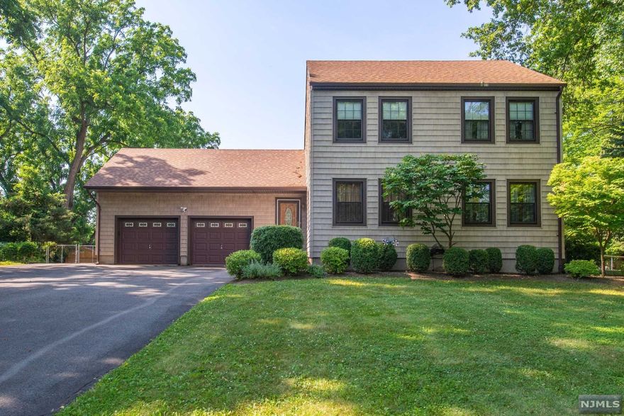 You won't want to miss this 3 bed, 2 FULL bath colonial. This gorgeous home with 2-year-old roof sits on a desired oversized lot showcasing countless windows and curb appeal. First floor offers a magnificent living room with cathedral ceilings featuring skylights with shades. A full bath and additional family room featuring a gas fireplace. The formal living room is being used as a dining room and is interchangeable based on your wishes. Head into the kitchen featuring an inviting breakfast bar with direct access to backyard filled. Second floor boasts 3 airy bedrooms. The full bath offers a jacuzzi and shower stall. Upstairs overlooks the family room. An unfinished basement with established gym is ready to be finished for additional living space gym equipment is included in sale! 2-CAR GARAGE and an oversized driveway with DIRECT ACCESS to the home! A fenced-in backyard with IN-GROUND SALTWATER POOL with BRAND NEW FILTER. A backup generator for entire house.