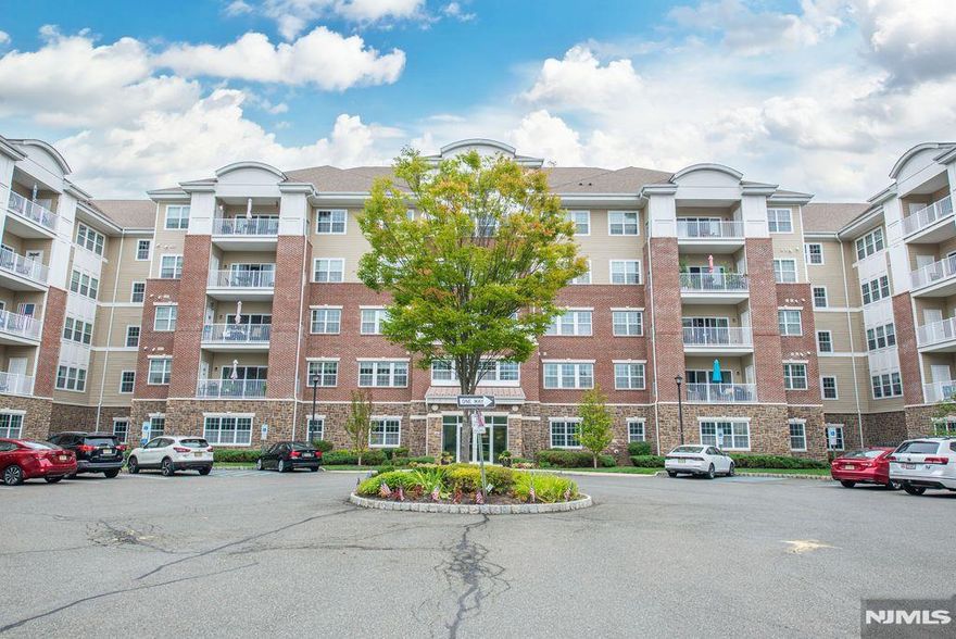 MOTIVATED SELLER! Welcome to the newest building in Wanaque Reserve, built in 2012! This beautiful 2-bedroom, 2-bath, first-floor condo is located in a premier 55+ gated community with 24-hour security. The home features a spacious eat-in kitchen with granite counters, stainless steel appliances, backsplash, pantry and a conveniently located laundry room. Enjoy a large living room with sliders to a private balcony, a formal dining room perfect for gatherings, a versatile den with French doors. One assigned garage space plus additional outdoor parking included. Upgrades include crown molding, tray ceilings, chair rail, detailed trim work, and elegant foyer pillars. Wanaque Reserve offers an unmatched lifestyle with a state-of-the-art clubhouse and cafe, indoor and outdoor pools, fitness center, theatre, ballroom, art studio, billiards room, saunas, and hot tub. Outdoor amenities include tennis, bocce, shuffleboard, and walking paths.With over 40 clubs and activities Travel Club, Wine Club, Pickleball, Bocce, and more there's something for everyone. HOA covers water & sewer. Wanaque Reserve offers residents a safe, active, and social community to enjoy while leaving behind the responsibilities of a single-family home. INTERIOR