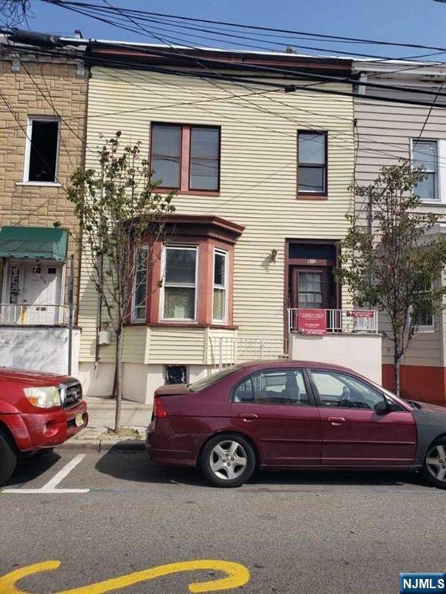 BRING YOUR BUYERS.. ORIGINAL ROW HOUSE ON TREE LINED STREET CLOSE TO ALL TRANSPORTATION AND HOUSES OF WORSHIP .. GREAT FOR BUILDERS AS WELL ..