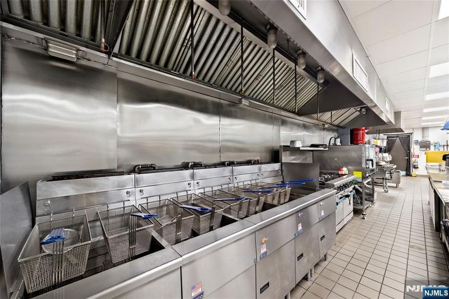 Experience a masterfully executed turnkey opportunity in the heart of Norwood, New Jersey. Established in 2023, this premier Korean culinary destination is situated within a sophisticated retail strip completed in 2022, offering an elite combination of high-visibility frontage and ample customer parking. The space defines modern efficiency, featuring a minimalist, art-forward dining area paired with an industrial-grade kitchen engineered for high-volume precision. The heart of the operation is a chefâ€™s masterpiece, anchored by a direct-imported German Rational iCombi Pro Oven. The facility is meticulously outfitted with all-new, UL & NSF certified equipment, including five new Pitco deep fryers, an eight-burner range, a specialized Kitchenall wok, and a double stock pot. Expansive cold storage solutions include a 10x13x8 ft walk-in cooler and a 10x5x8 ft walk-in freezer, supported by advanced preparation tools like a vacuum marinade tumbler and a dedicated oil filtration system. Behind the scenes, the infrastructure is robust, featuring a 5-ton HVAC system, high-capacity water boiler, and a state-of-the-art Hood and Ansol system vented to the exterior. This is a rare, plug-and-play asset in one of Norwoodâ€™s newest developments, offering an immediate entry into the thriving Korean chicken market. To ensure a seamless transition and continued success, the seller is offering all proprietary secrets and recipes with the sale.