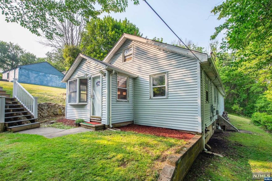 Ranch nestled on private lot! Spacious eat-in-kitchen, living room and family room. Tons of potential to finish! Large back deck, 22x18. Large, detached 2 car garage. Plenty of parking. 3 Generous Sized bedrooms and 2 full baths. Primary suite with full bath. Ideal location for commuters, NYC-Direct Train Stations or Bus. Easy access to major highways. Desirable area close to shopping & restaurants.