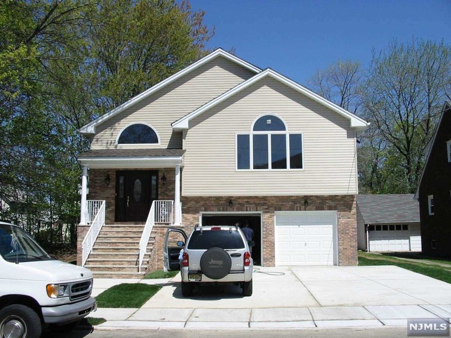 Spacious 3400 sq ft custom 2-family built in 2003. Cherry cabinets and granite tops in all kitchens and bathrooms. Hardwood floors and porcelain tile throughout. 1st fl unit has 2 bed, 1 bath, EIK with peninsula and living room. 2nd fl unit has 3 bed, 2 bath, dining room, EIK, cathedral foyer and living room. Central air and baseboard heat. Separate utilities and laundry rooms. 2 car garage and 3 car driveway. 5 min walk to either bus or train station. Tenants are month-to-month so buyer can move into either unit or purchase as investment property.Best and final deadline 5/5 2pm.