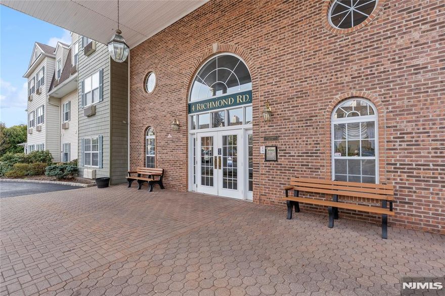 Welcome to this bright and spacious, rarely available Heritage model, nestled in the heart of West Milford's premier 55+ community. This well-maintained unit offers a unique and thoughtful layout: the second bedroom has been expertly utilized as a formal dining room, creating an expansive, open-concept feel perfect for hosting family and friends. Need a second bedroom instead? It can easily be converted back to its original 2-bedroom floor plan! This unit is perfectly positioned to offer private, wooded views from every window. Living at Bald Eagle Commons offers the maintenance-free lifestyle you deserve. Enjoy access to the Grange Hall clubhouse, a heated outdoor pool, tennis/pickleball courts, and a full calendar of social activities. With assigned parking just steps away and a storage unit included, this is senior living at its finest. Just move in and let the association handle the snow and lawn you focus on the fun!