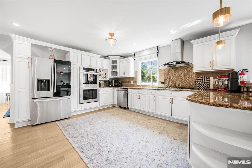 Photo of 620 Lackawanna Avenue, Woodland Park, NJ 07424 (MLS # 25037521)