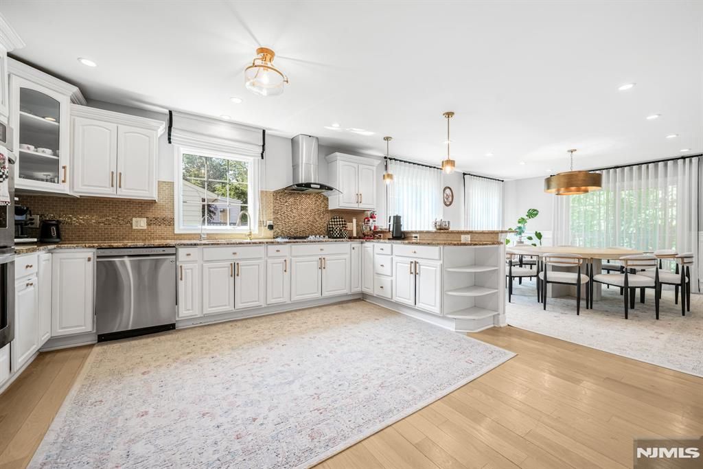 Photo of 620 Lackawanna Avenue, Woodland Park, NJ 07424 (MLS # 25037521)