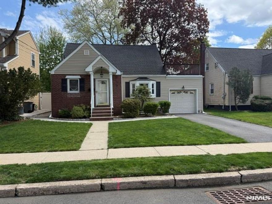 Welcome to this beautifully updated, maintenance-free Cape Cod nestled on a quiet residential street in one of Rochelle Parkâ€™s most sought-after neighborhoods. The first floor features a modern eat-in kitchen with maple cabinetry, newer stainless-steel appliances, and a stunning marble-tiled bathroom. Newly refinished hardwood oak floors, upgraded lighting throughout, and added closet lighting with dimmer switches enhance both style and functionality. This level also includes a spacious primary bedroom and an additional bedroom. Upstairs, youâ€™ll find two generously sized bedrooms with abundant closet and storage space, along with access to a private rooftop deckâ€”perfect for relaxing or entertaining. The full basement is dry, freshly painted, and equipped with a new sump pump and French drain system, offering excellent storage or potential for additional living space. Step outside to a beautifully maintained yard designed for entertaining, featuring a Trex deck, lush green lawn, storage shed, and a new sliding door for easy indoor-outdoor access. Conveniently located near major highways, public transportation, shopping in Paramus, restaurants, theaters, and parks, this home also offers an easy commute to NYC. Move-in ready and sure to attract attentionâ€”donâ€™t miss your chance to make it yours! Showings begin April 26, 2026, at the Open House from 1pm to 4pm.