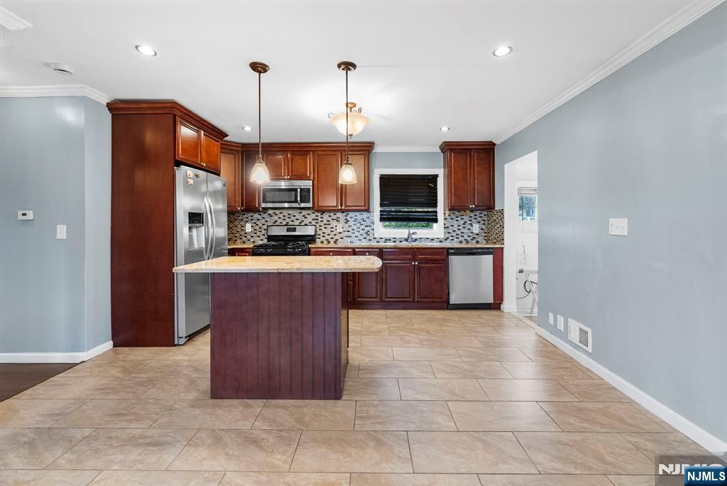 Photo of 15 Carrelton Drive, Paterson, NJ 07522 (MLS # 25037953)