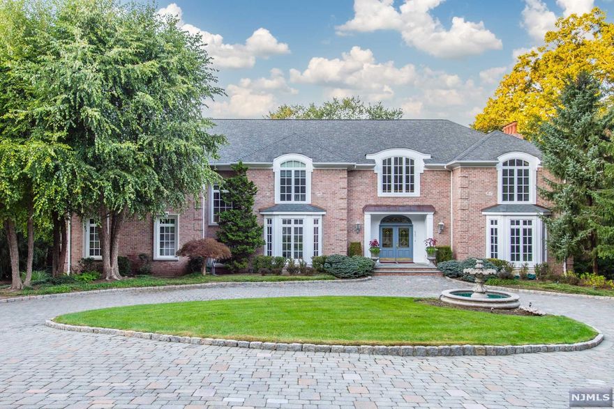 Drive down the circular paver courtyard with a gracious fountain nestled on a Cul-de-Sac in the prestigious West-Gate Urban Farms neighborhood. Elegant 6 BEDROOM is set on an exceptionally PRIVATE 2.1 ACRE property. Enter into the classic marble foyer (heated flrs) and delight at the OPEN FLOOR PLAN. An entertainers Dream, the Chef's Kitchen w a large CENTER ISLAND, pantry, wall of windowed cabinetry & Breakfast RM w a beautiful vaulted ceiling & French drs leads to deck. Featuring two-story Great RM w FPL, Formal Living & Dining Rm, Solarium/Play Rm, wood-paneled Study w FPL, In-Law Suite, Laundry Rm & 2/PWDR RMS. PRIMARY SUITE offers magnificent views, DUAL-FPL, two walk-in closets & en-suite bthrm w heated flrs. Two Bedrooms share a Jack & Jill bathroom, two additional BDRMS & full bath. Lower-level is anchored by stone FP, built-in wet bar, billiard rm, gym, full bth. Walk-out access to park-like grounds w Gunite Pool, Spa, Outdoor KTCHN. 3/Car Attached Garage