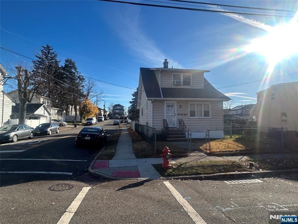 Photo of 98 Dundee Avenue, Paterson, NJ 07503 (MLS # 25043105)