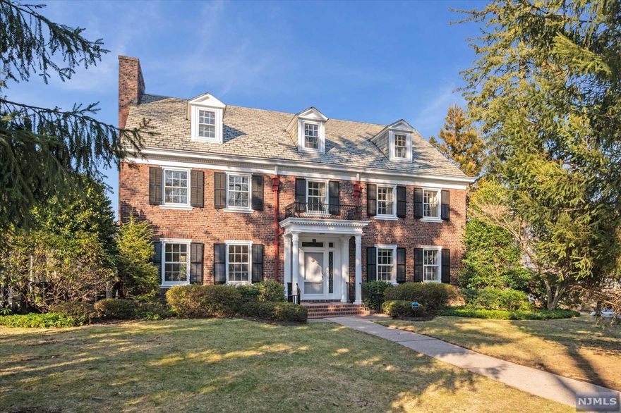 Welcome to this Georgian mansion in the heart of the Estate Section of Historic Montclair, which boasts 16 stately rooms, 6 oversized bedrooms, 4.2 pristine baths. An original brick privacy wall surrounds the mature planted estate with an in-ground pool. The center hall masterpiece has a welcoming oversized foyer with the ultimate grand staircase that guarantees a glamorous entrance. Every detail abounds in all the formal rooms with gleaming original hardwood floors, original mouldings, Palladium windows all the fine points you expect from a home of this distinction. Super close to NYC trains and vibrant artsy Montclair, known for its restaurants, entertainment venues, and lively social scene.