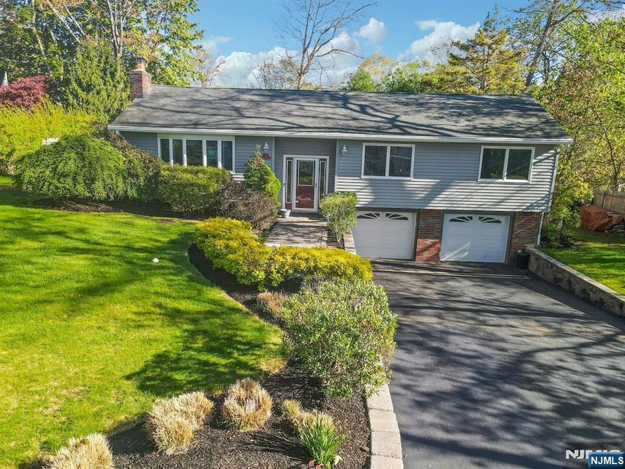 Beautifully maintained raised ranch in desirable Lower West Milford! This move-in-ready home features an updated kitchen and bathrooms, along with Anderson windows, newer siding, and roof. Both interior and exterior doors have been replaced, reflecting true pride of ownership throughout. Enjoy outdoor living on the expansive Trex deck complete with lighted postsâ€”perfect for entertaining. The lower level offers a spacious family room with a cozy wood-burning fireplace, ideal for relaxing evenings. Situated on a perfectly manicured lot and conveniently located just minutes from Route 23 North and South, this home is a commuterâ€™s dream. With too many upgrades to list, this is truly a must-see property to fully appreciate all it has to offer!